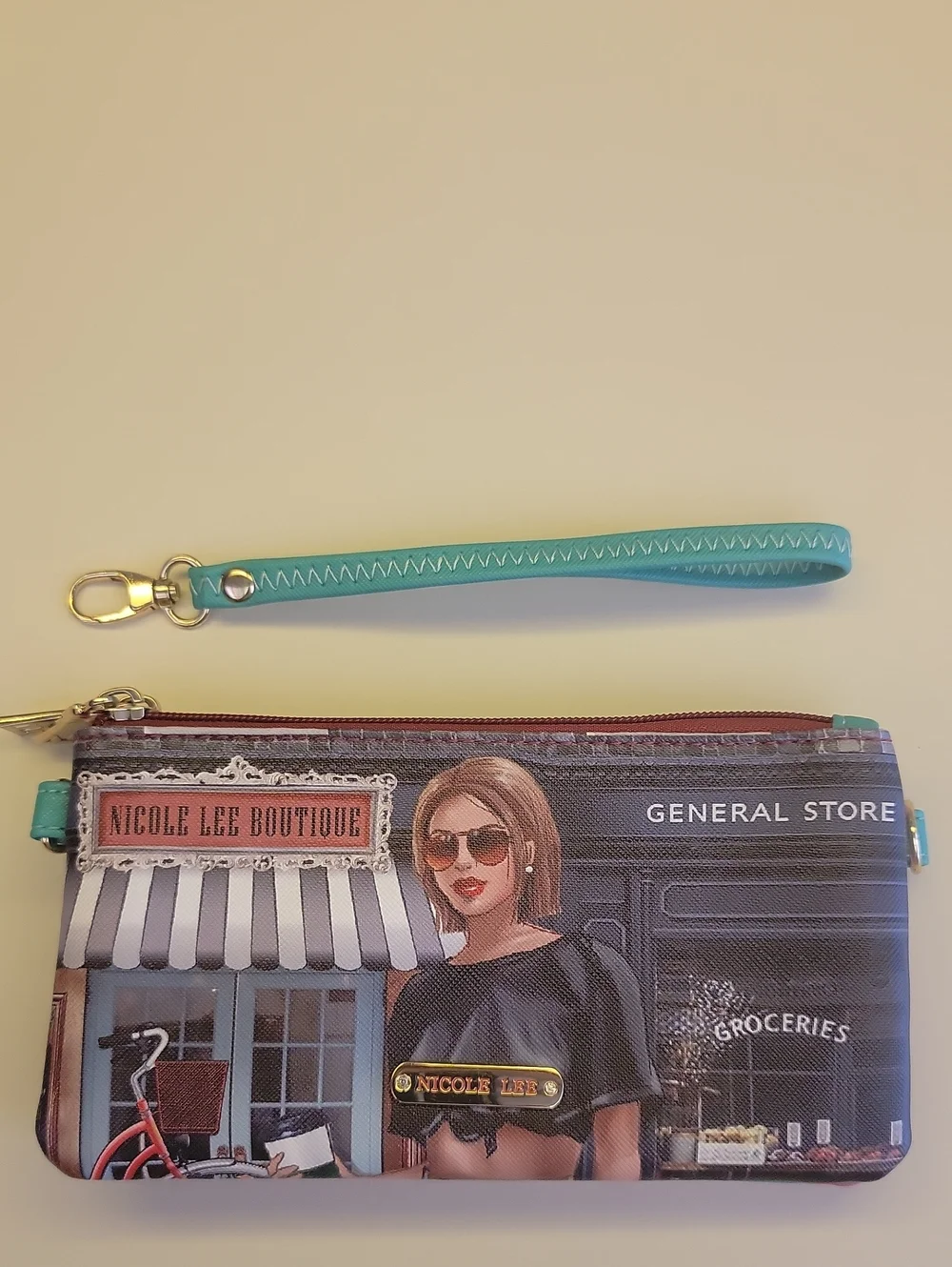 Nicole Lee Turquoise Multi-Panel Printed Wristlet